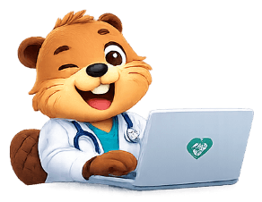 Clinic beaver mascot working on a laptop